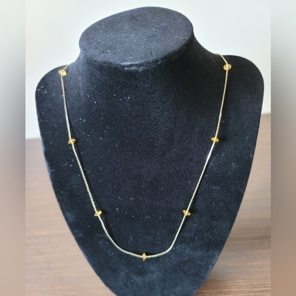 Golden and orange beaded necklace marked Korea